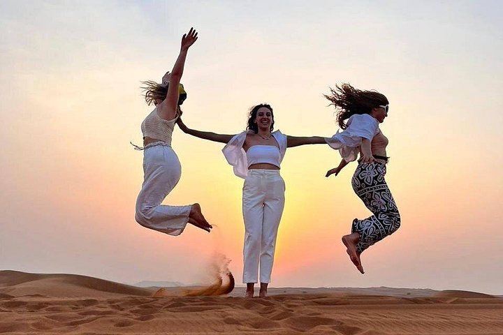 Experience a thrilling desert safari in Dubai with dune bashing, quad biking, camel rides, and a BBQ dinner under the stars, photo 10 | wizardtrip