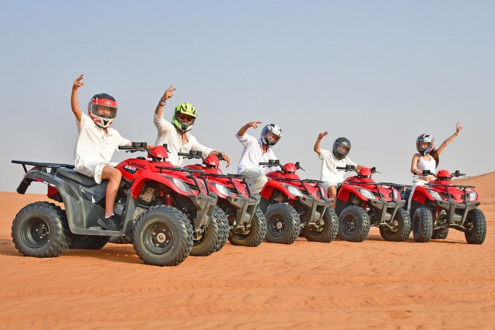 Experience a thrilling desert safari in Dubai with dune bashing, quad biking, camel rides, and a BBQ dinner under the stars, photo 12 | wizardtrip