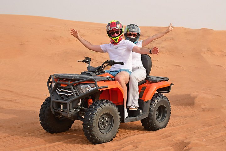 Experience a thrilling desert safari in Dubai with dune bashing, quad biking, camel rides, and a BBQ dinner under the stars, photo 14 | wizardtrip