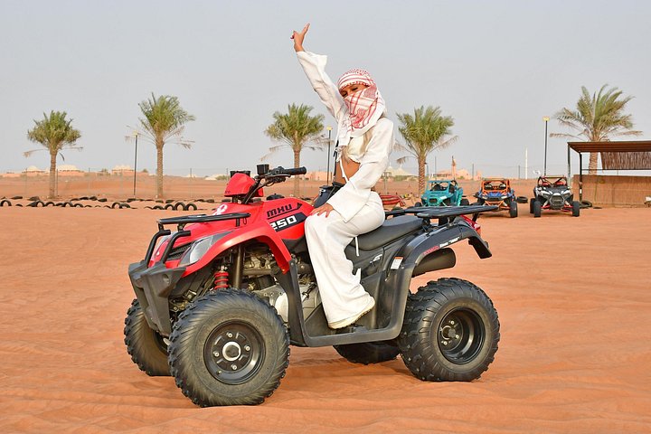 Experience a thrilling desert safari in Dubai with dune bashing, quad biking, camel rides, and a BBQ dinner under the stars, photo 18 | wizardtrip