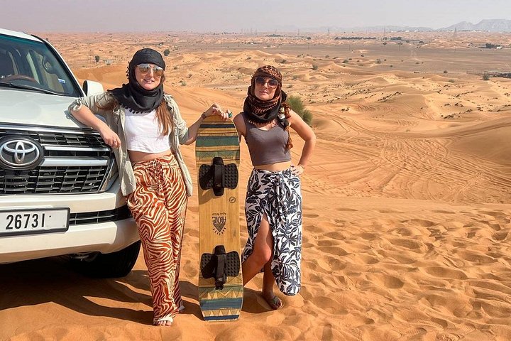 Experience a thrilling desert safari in Dubai with dune bashing, quad biking, camel rides, and a BBQ dinner under the stars, photo 19 | wizardtrip