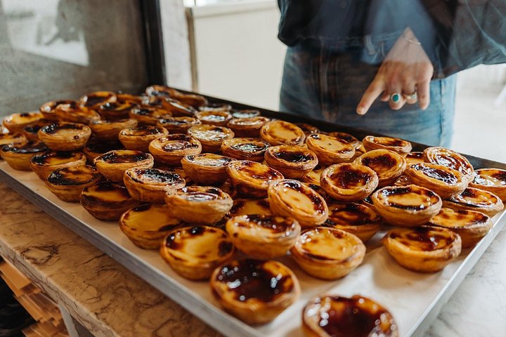 Un voyage culinaire à travers les quartiers historiques de Lisbonne, dégustant de la nourriture et des boissons traditionnelles portugaises, photo 7 | wizardtrip