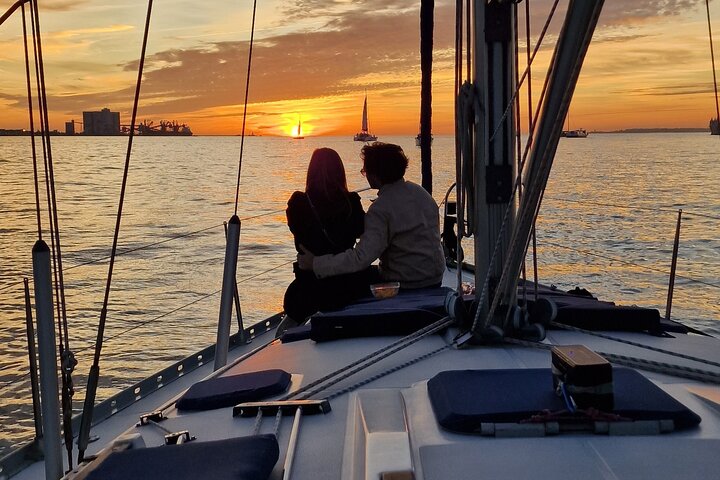 Enjoy a sunset sailing tour in Lisbon with wine and historical sights, photo 8 | wizardtrip