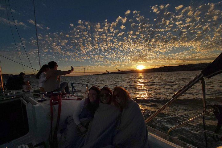 Enjoy a sunset sailing tour in Lisbon with wine and historical sights, photo 10 | wizardtrip