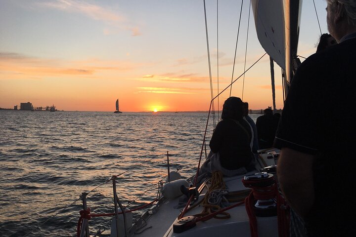 Enjoy a sunset sailing tour in Lisbon with wine and historical sights, photo 12 | wizardtrip