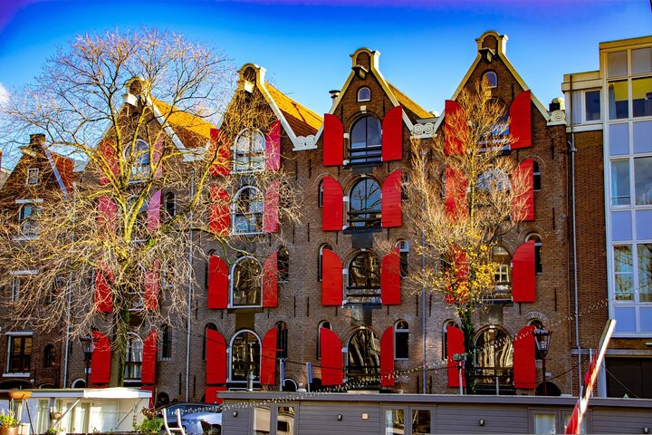 Nyd et naturskønt 90-minutters kanalkrydstogt gennem Amsterdams historiske vandveje på en åben båd, foto 9 | wizardtrip
