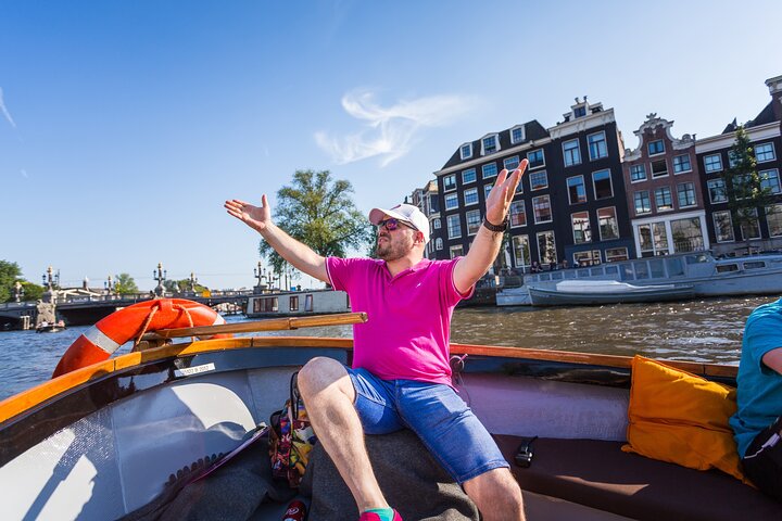 Nyd et naturskønt 90-minutters kanalkrydstogt gennem Amsterdams historiske vandveje på en åben båd, foto 10 | wizardtrip