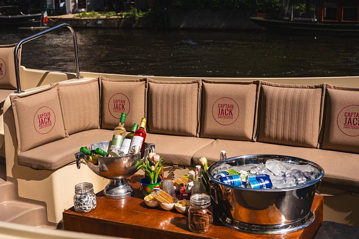 Nyd et naturskønt 90-minutters kanalkrydstogt gennem Amsterdams historiske vandveje på en åben båd, foto 11 | wizardtrip