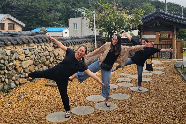 Private tour exploring Busan's landmarks like temples, markets, and coastal views, photo 18 | wizardtrip