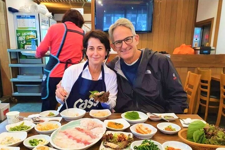 Private tour exploring Busan's landmarks like temples, markets, and coastal views, photo 28 | wizardtrip