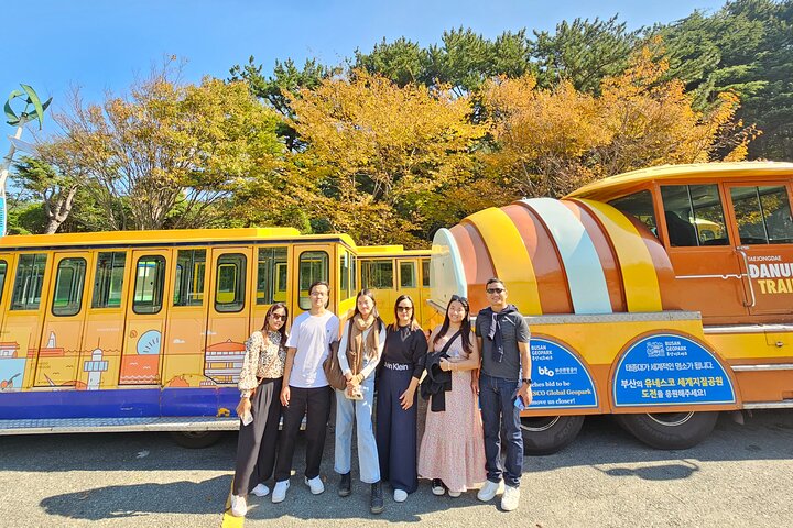 Private tour exploring Busan's landmarks like temples, markets, and coastal views, photo 33 | wizardtrip