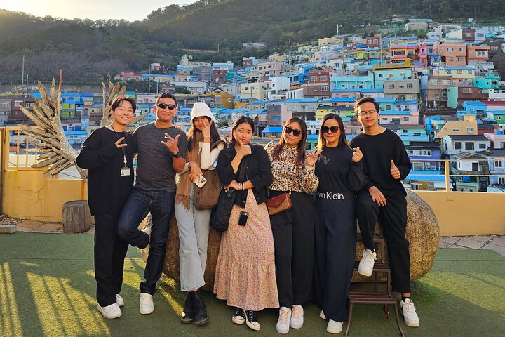 Private tour exploring Busan's landmarks like temples, markets, and coastal views, photo 35 | wizardtrip