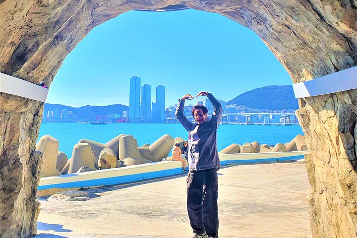 Private tour exploring Busan's landmarks like temples, markets, and coastal views, photo 39 | wizardtrip
