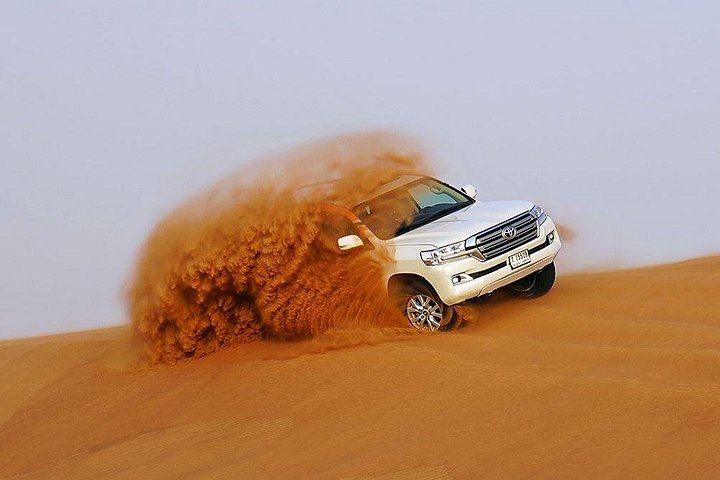 VIP Red Dune Safari Dubai, Pick-up/Drop-off, Camel Ride, Quad & BBQ Dinner | wizardtrip