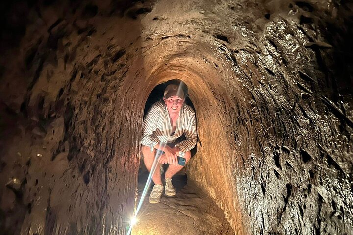 Utforsk de historiske Cu Chi-tunnelene, et nettverk av underjordiske passasjer brukt under Vietnamkrigen, nær Ho Chi Minh-byen, foto 6 | wizardtrip