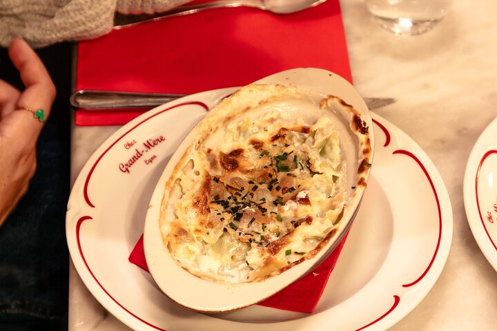 A guided food tour in Lyon, France, featuring local delicacies and wine tastings, photo 10 | wizardtrip