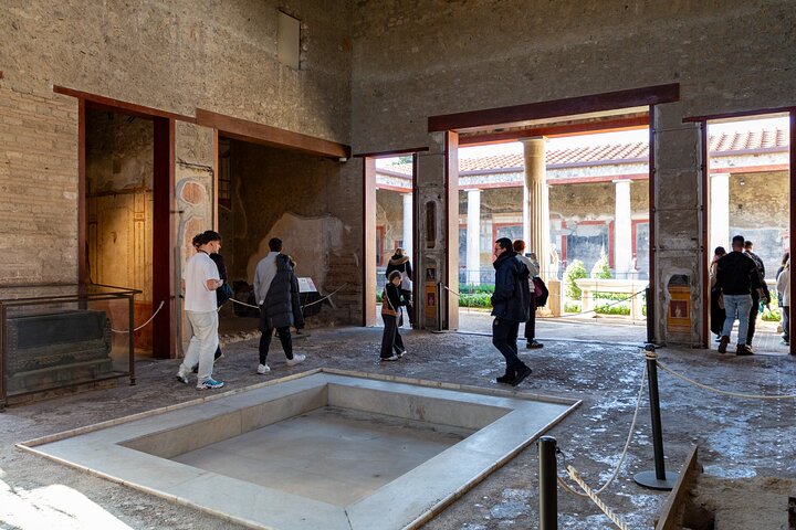 Guided tour of the ancient ruins of Pompeii, Italy, with a focus on historical sites and artifacts, photo 13 | wizardtrip