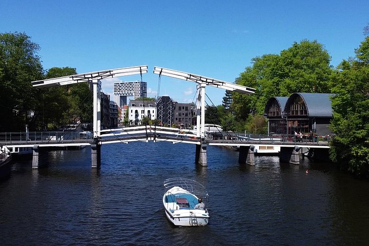 Privat kanalkryssning i Amsterdam med guide och drycker, foto 14 | wizardtrip