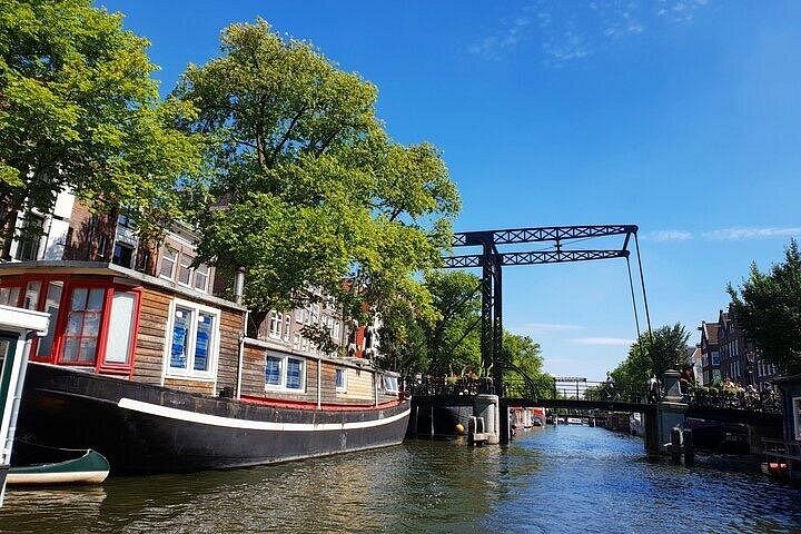 Privat kanalkryssning i Amsterdam med guide och drycker, foto 32 | wizardtrip