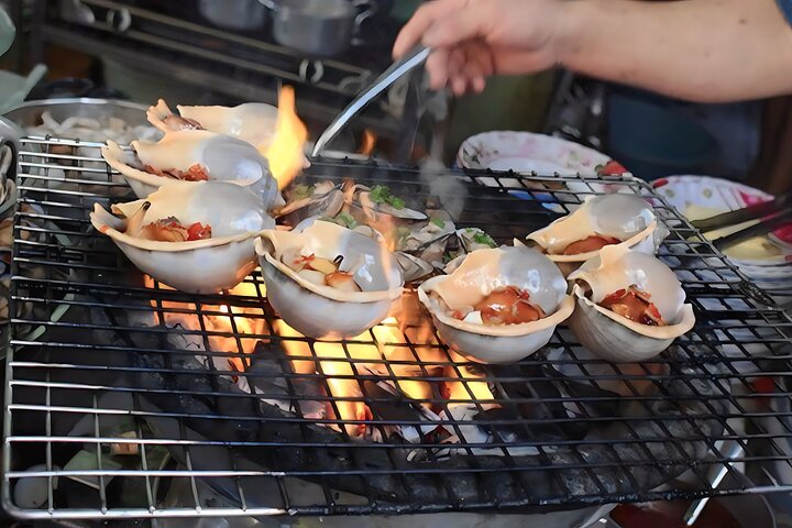 Tour de street food primé à Ho Chi Minh-Ville avec des chauffrices sur des scooters, photo 8 | wizardtrip