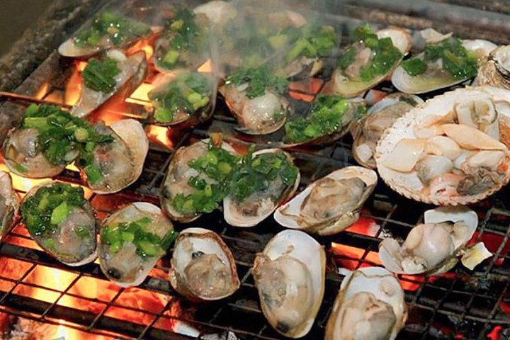Tour de street food primé à Ho Chi Minh-Ville avec des chauffrices sur des scooters, photo 15 | wizardtrip