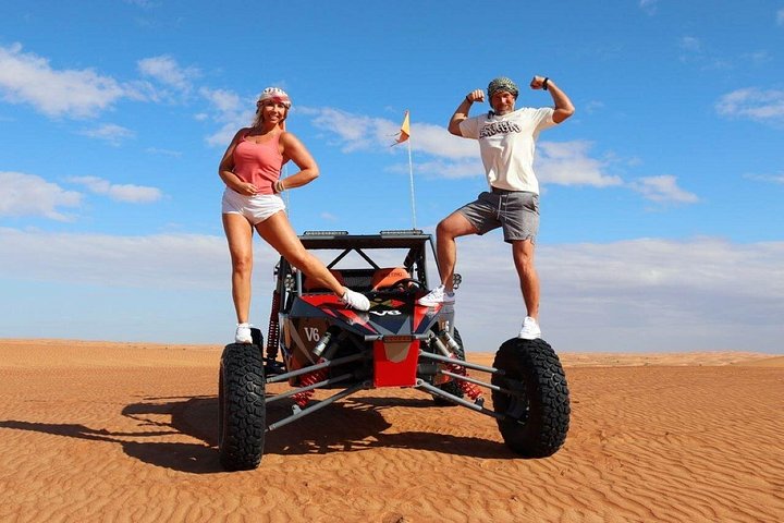 Private dune buggy and sandboarding adventure in the Dubai desert, photo 13 | wizardtrip
