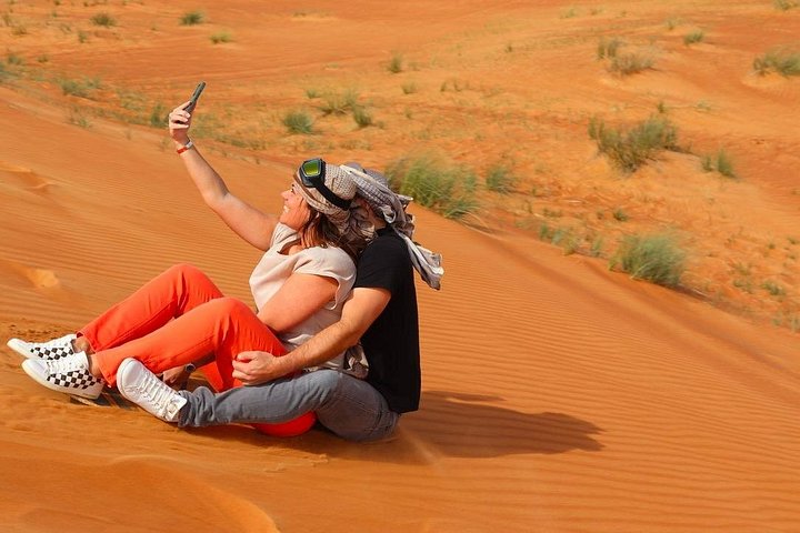 Private dune buggy and sandboarding adventure in the Dubai desert, photo 16 | wizardtrip