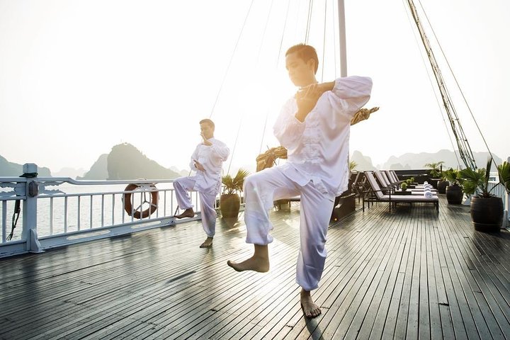 Overnight cruise adventure in Halong Bay, Vietnam, featuring limestone karsts, kayaking, and onboard dining, photo 13 | wizardtrip