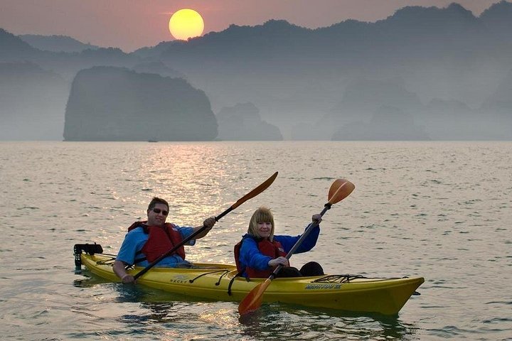 Overnight cruise adventure in Halong Bay, Vietnam, featuring limestone karsts, kayaking, and onboard dining, photo 17 | wizardtrip