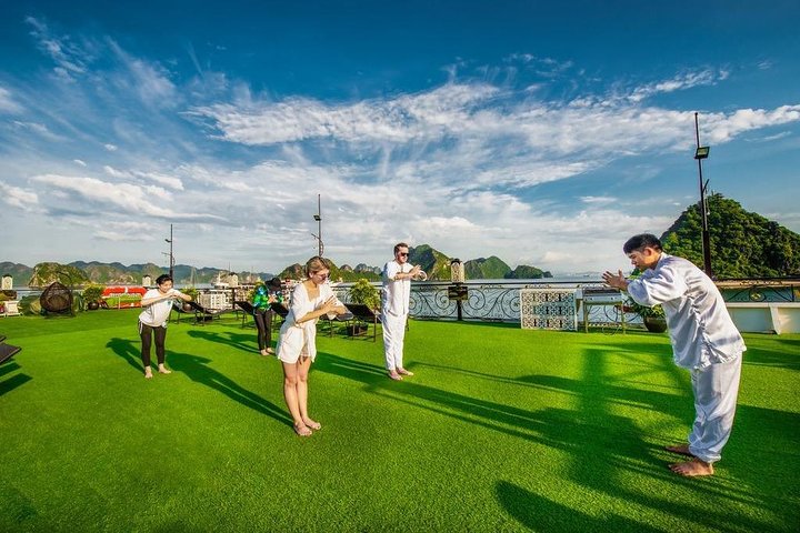 Overnight cruise adventure in Halong Bay, Vietnam, featuring limestone karsts, kayaking, and onboard dining, photo 22 | wizardtrip