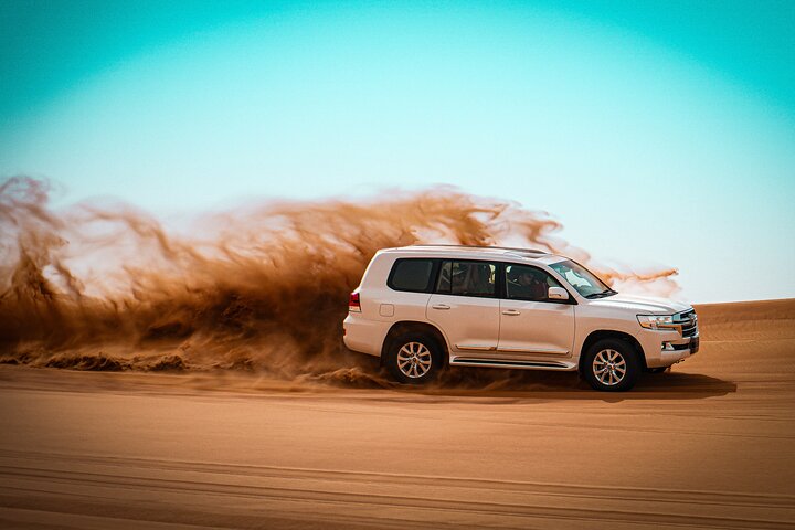 Morning desert safari adventure in Dubai with dune bashing, quad biking, sandboarding, and camel rides, photo 9 | wizardtrip