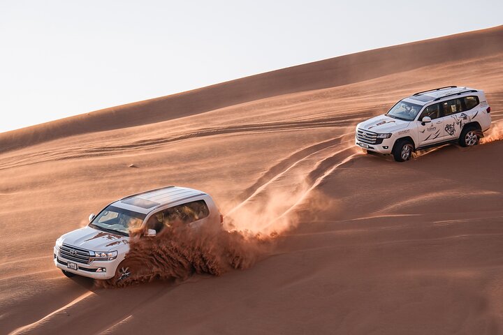 Morning desert safari adventure in Dubai with dune bashing, quad biking, sandboarding, and camel rides, photo 10 | wizardtrip