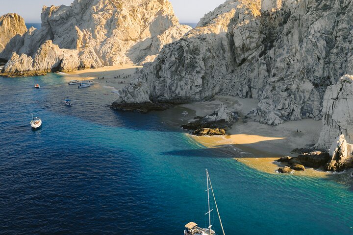 Enjoy a vibrant sunset cruise in Cabo San Lucas with an open bar and scenic views of the Arch, photo 11 | wizardtrip