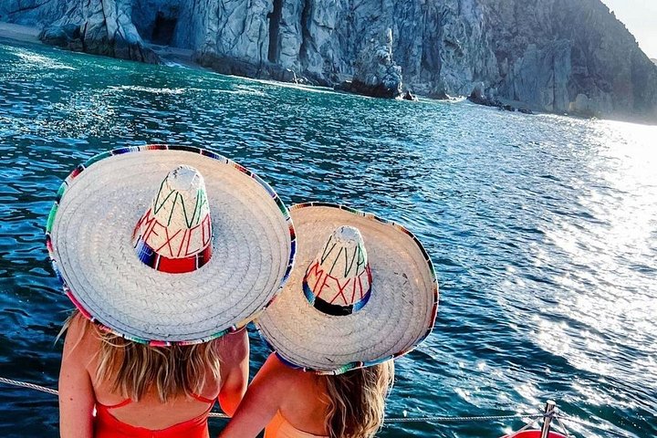 Enjoy a vibrant sunset cruise in Cabo San Lucas with an open bar and scenic views of the Arch, photo 13 | wizardtrip