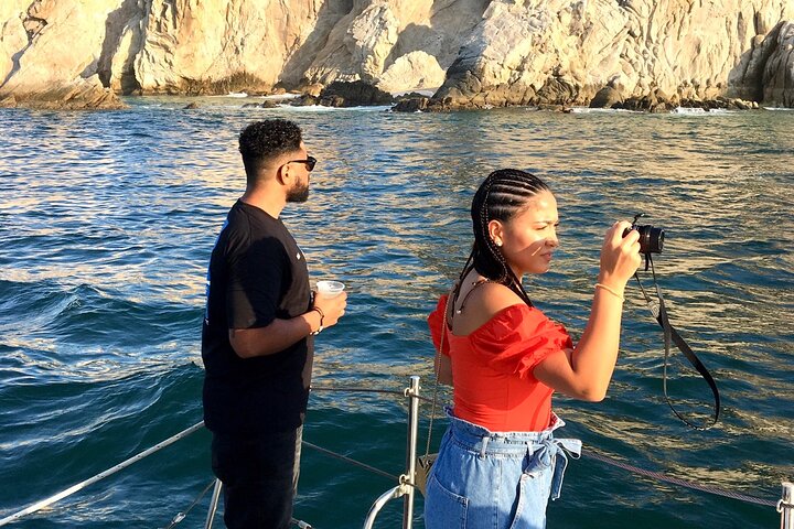 Enjoy a vibrant sunset cruise in Cabo San Lucas with an open bar and scenic views of the Arch, photo 16 | wizardtrip