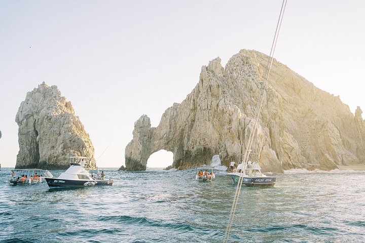 Enjoy a vibrant sunset cruise in Cabo San Lucas with an open bar and scenic views of the Arch, photo 19 | wizardtrip
