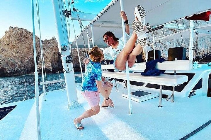 Enjoy a vibrant sunset cruise in Cabo San Lucas with an open bar and scenic views of the Arch, photo 21 | wizardtrip
