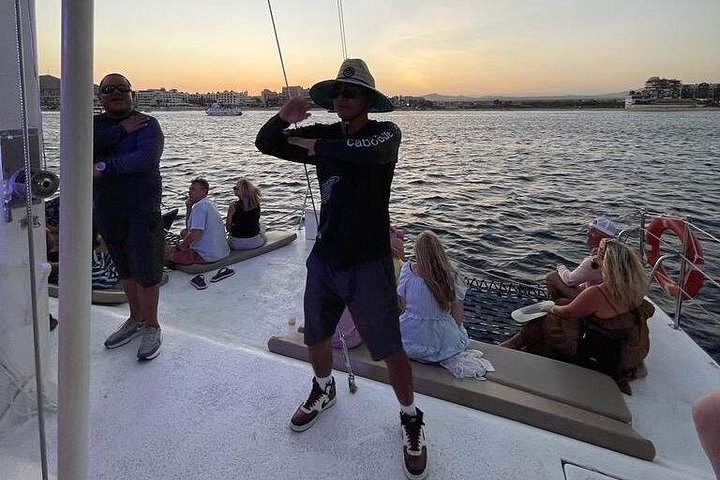 Enjoy a vibrant sunset cruise in Cabo San Lucas with an open bar and scenic views of the Arch, photo 31 | wizardtrip
