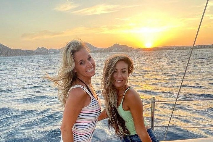 Enjoy a vibrant sunset cruise in Cabo San Lucas with an open bar and scenic views of the Arch, photo 32 | wizardtrip