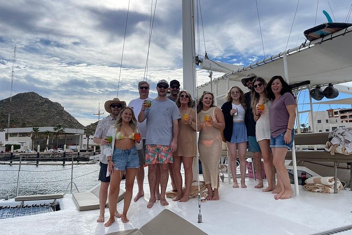 Enjoy a vibrant sunset cruise in Cabo San Lucas with an open bar and scenic views of the Arch, photo 39 | wizardtrip