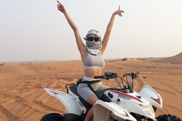 Morning Red Dunes Safari: Quad Biking, Sandboarding & Camel Ride | wizardtrip