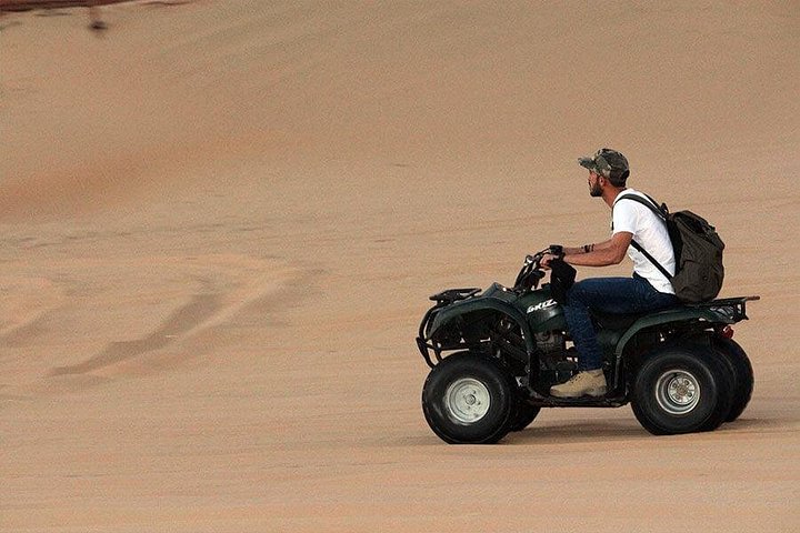 Morning desert safari in Dubai with quad biking, sandboarding, and camel rides on red dunes, photo 7 | wizardtrip