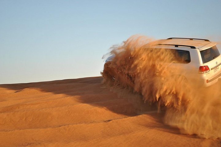 Morning desert safari in Dubai with quad biking, sandboarding, and camel rides on red dunes, photo 10 | wizardtrip