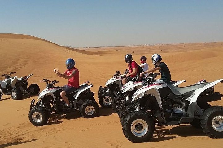 Morning desert safari in Dubai with quad biking, sandboarding, and camel rides on red dunes, photo 11 | wizardtrip