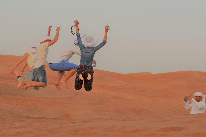 Morning desert safari in Dubai with quad biking, sandboarding, and camel rides on red dunes, photo 14 | wizardtrip