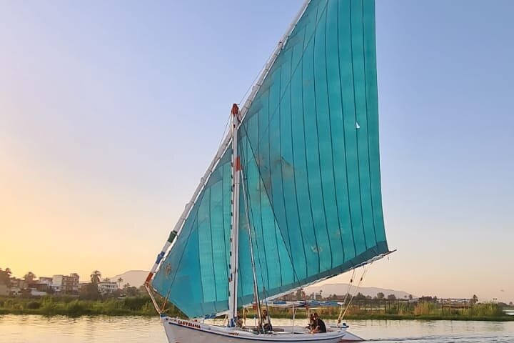 Enjoy a serene sunset sail on a traditional felucca boat along the Nile River in Luxor, Egypt, photo 12 | wizardtrip