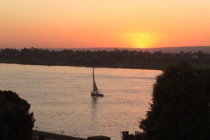 Enjoy a serene sunset sail on a traditional felucca boat along the Nile River in Luxor, Egypt, photo 17 | wizardtrip