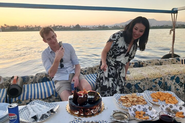 Enjoy a serene sunset sail on a traditional felucca boat along the Nile River in Luxor, Egypt, photo 23 | wizardtrip