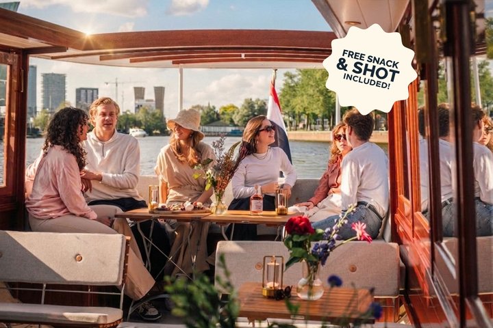 Luxury canal cruise in Amsterdam with cocktails and snacks, passing by historic landmarks, photo 1 | wizardtrip