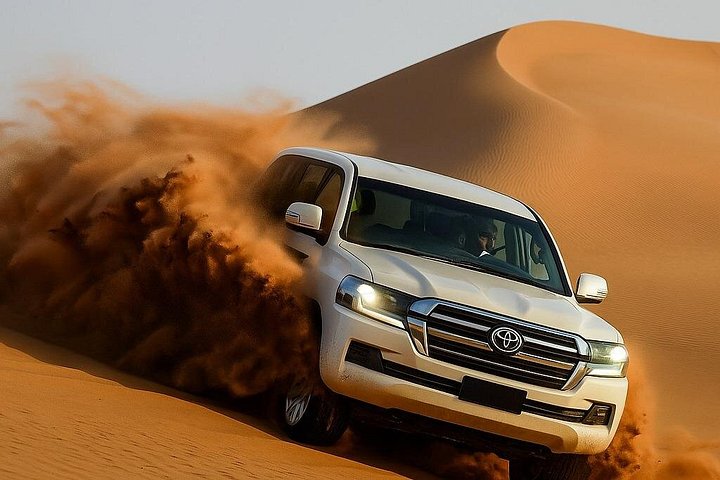 Sperimenta un emozionante safari nel deserto di Dubai con dune bashing, giri in cammello e cena BBQ, foto 12 | wizardtrip